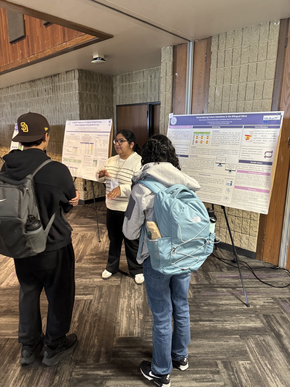 Grace Juarez presenting our joint work at a poster session